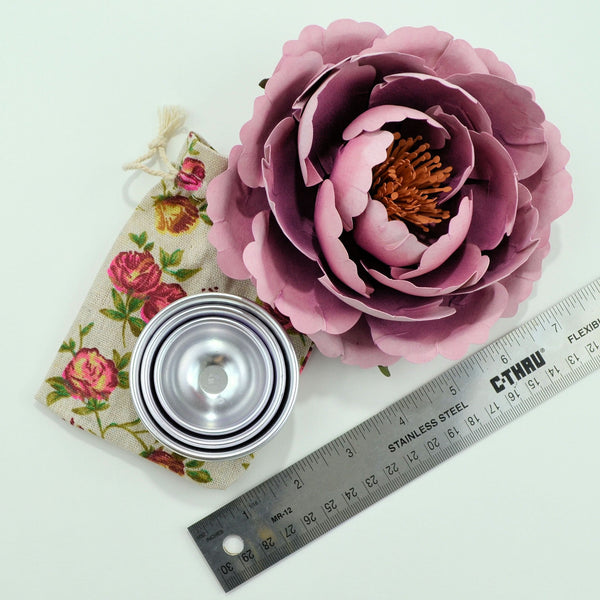 set of 3 metal shaping cups next to ruler and pink paper peony paper flower